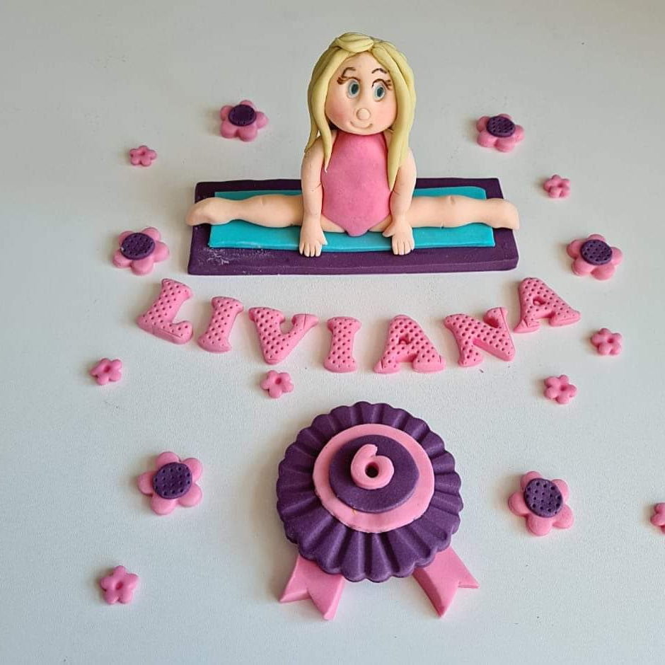 Edible gymnast cake decoration