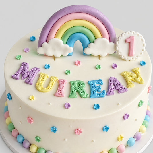 Eetbare regenboogtaarttopper, fondant glazuurdecoratie